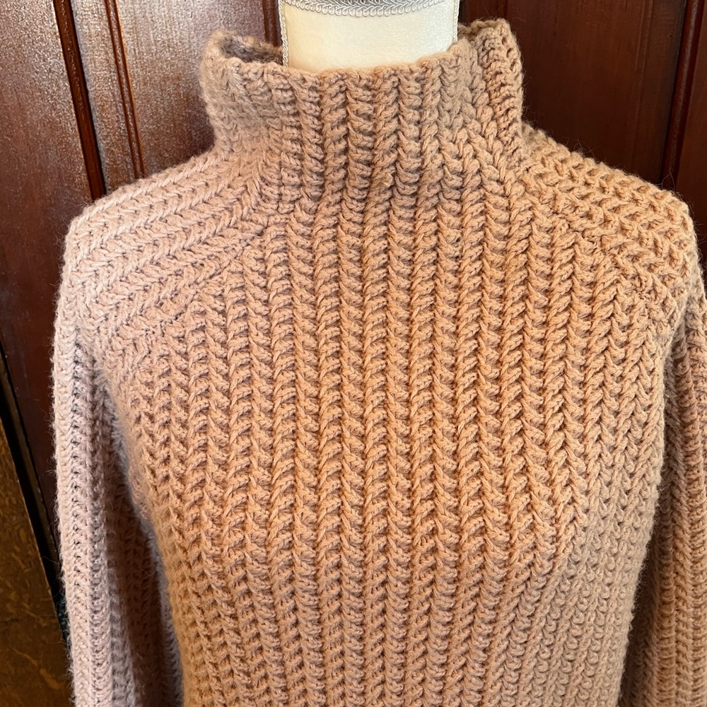 Mildly heavyweight mock turtleneck Mauve in color